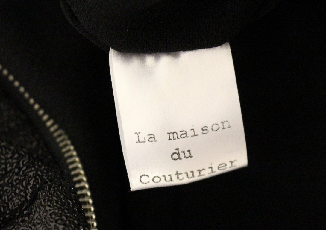 Елегантний чорний шкіряний комбінезон La Maison du Couturier з ремінцем на поясі