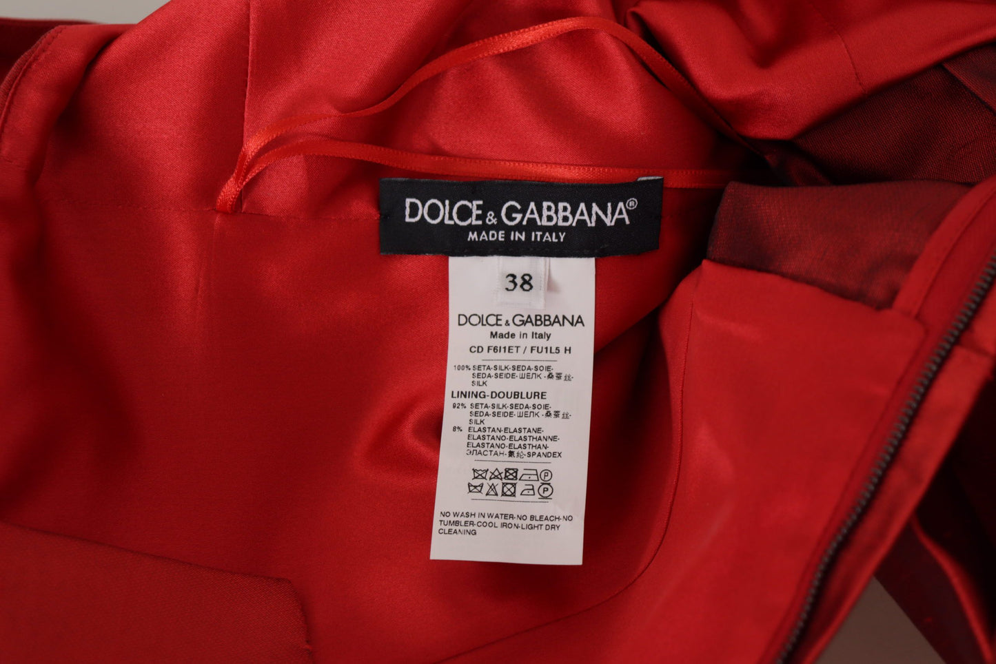 Сяюча червона шовкова сукня міді А-силуету Dolce &amp; Gabbana