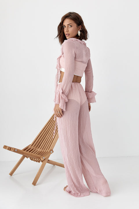 Transparent beach suit with ruffles