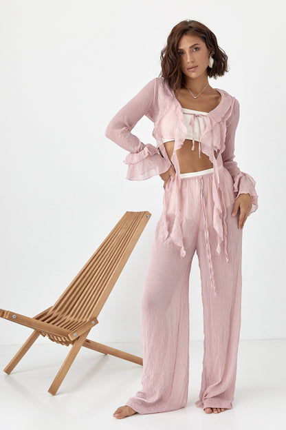 Transparent beach suit with ruffles