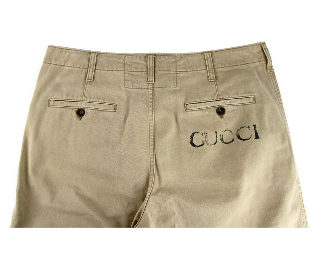 Світло-коричневі випрані бавовняні штани з принтом Gucci