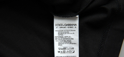 Елегантна чорна бавовняна футболка Dolce &amp; Gabbana з круглим вирізом і деталлю собачки