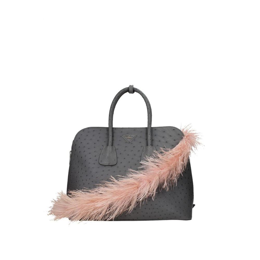 Рожевий шкіряний аксесуар Prada