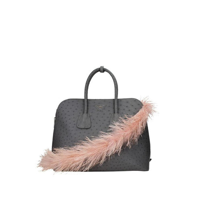 Рожевий шкіряний аксесуар Prada