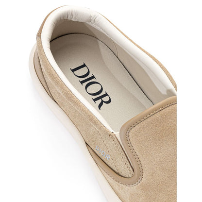 Бежеві шкіряні кросівки Dior