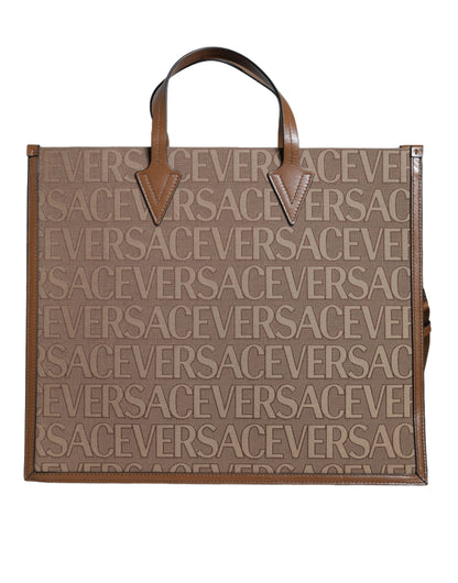 Коричнева сумка Versace через плече з жакардовою шкіряною ручкою та логотипом