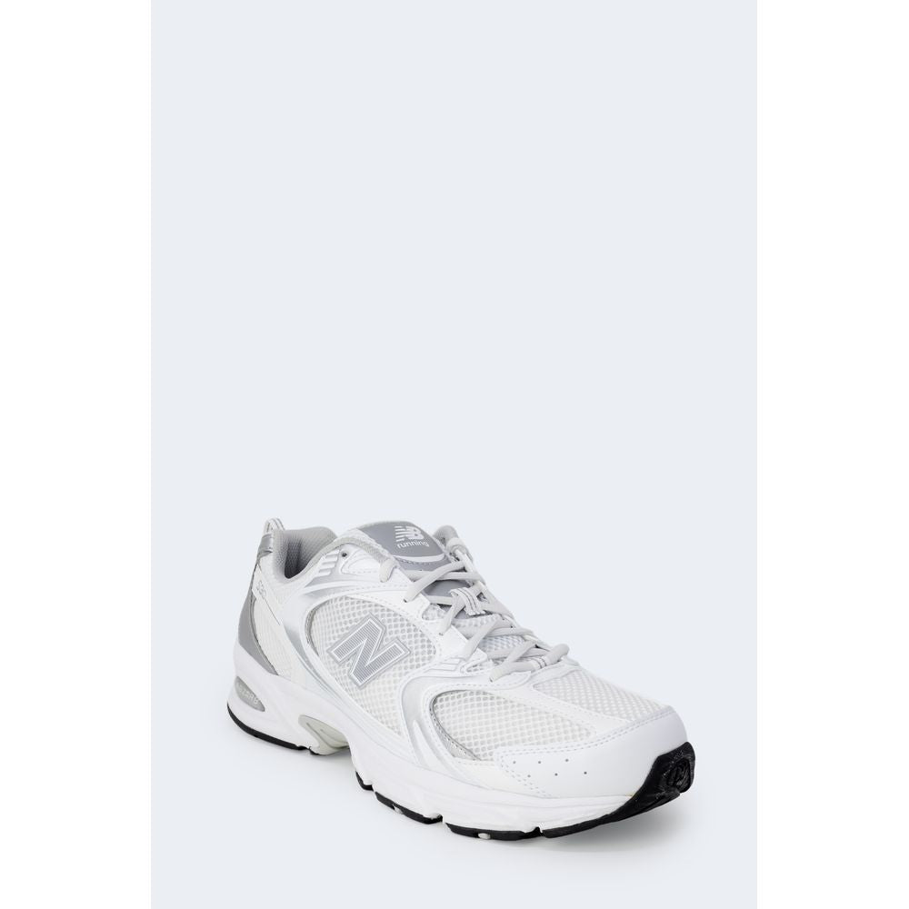 Сірі кросівки New Balance із синтетичної шкіри