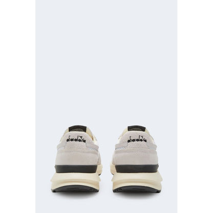Білі шкіряні кросівки Diadora