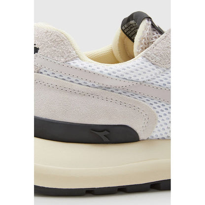 Білі шкіряні кросівки Diadora