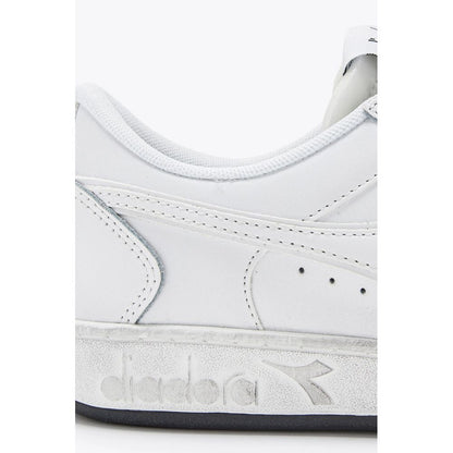 Білі шкіряні кросівки Diadora