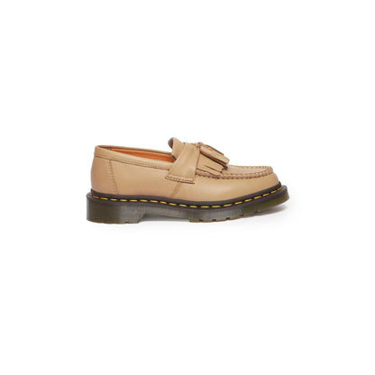 Бежеві шкіряні туфлі на плоскому ходу Dr. Martens