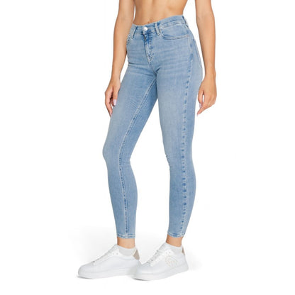 Світло-блакитні бавовняні джинси та штани Tommy Hilfiger Jeans